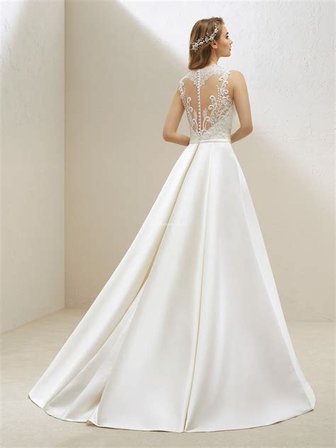 Tienda CACERES: vestidos de novia y trajes de fiesta .